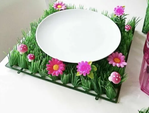 False grass plate with flowers