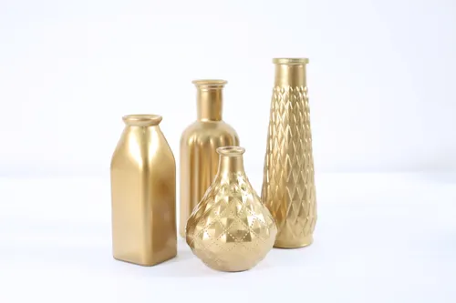 Assortment of golden decanters