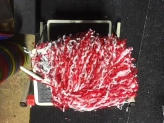 Thin Red and White Pom Poms