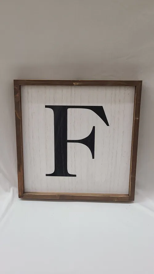 White Framed F Sign