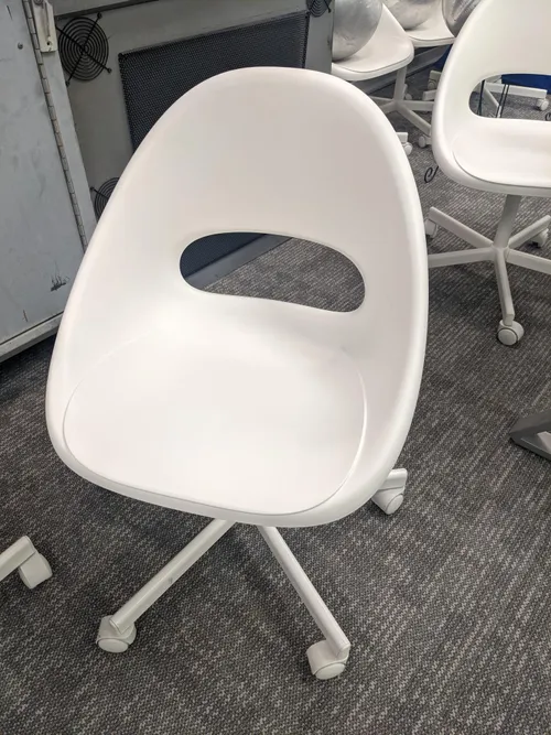 white rolling chair nasa