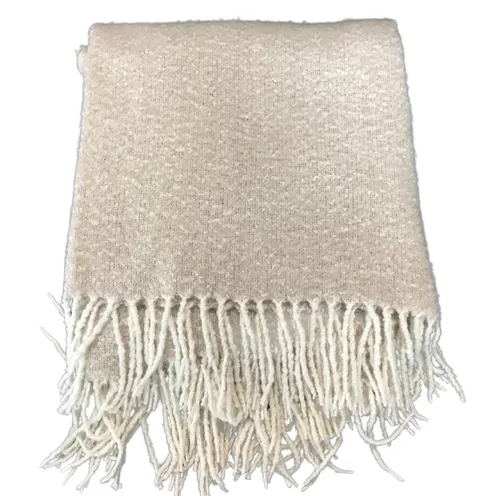 Beige throw with fringe 