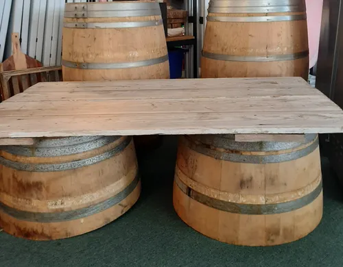 Rustic low grazing table with wine barrel base