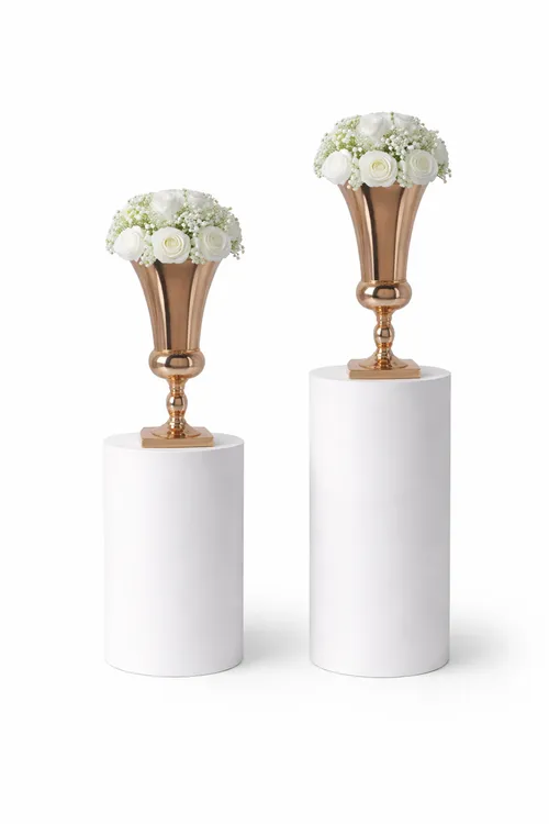 Gold Vases on White Pedestals