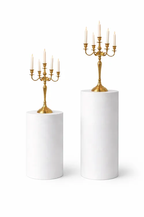 Gold Candelabras on White Pedestals