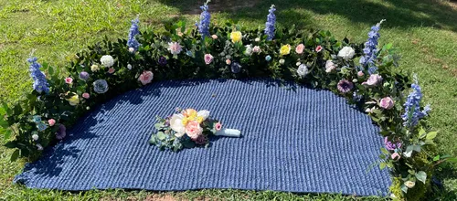 Grounded Floral Arbor