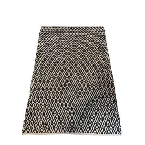 Black Leather & White Carpet Rug