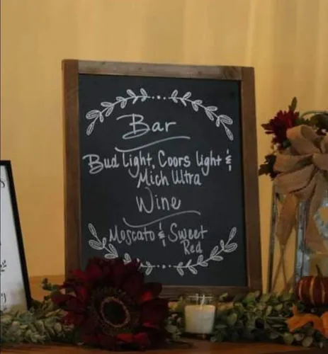 SIGN: chalkboard with arched leaves design