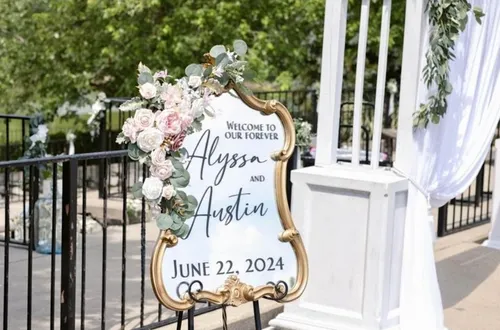 SIGN: ornate gold frame mirror