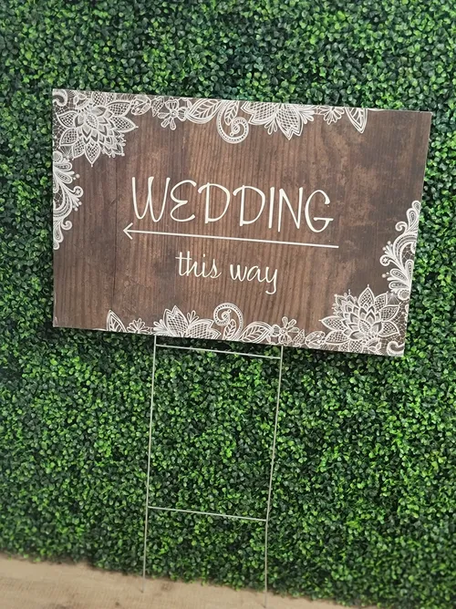 SIGN: outdoor Wedding this way <--
