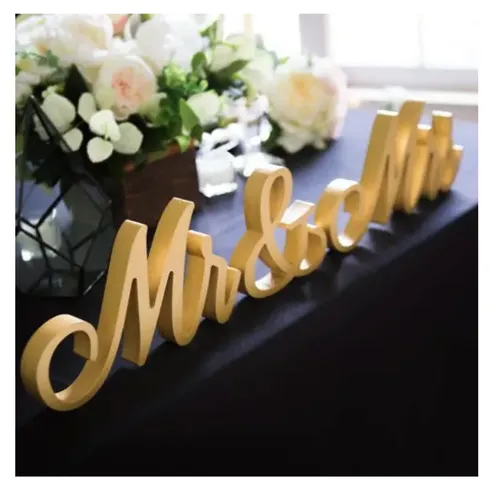 Mr & Mrs golden wooden sign