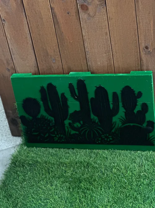 Cactus metal art on wooden frame 