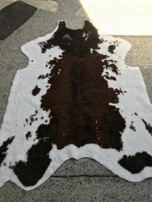 Faux cow skin rugs - assorted