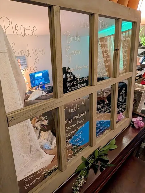 Rustic mirror seating chart display