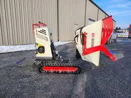 Self loading tracked dumper