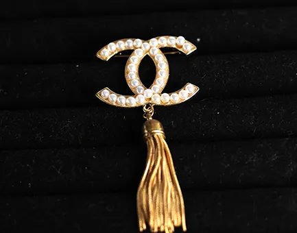 Chanel Logo Pearl Brooch with Gold Tassel