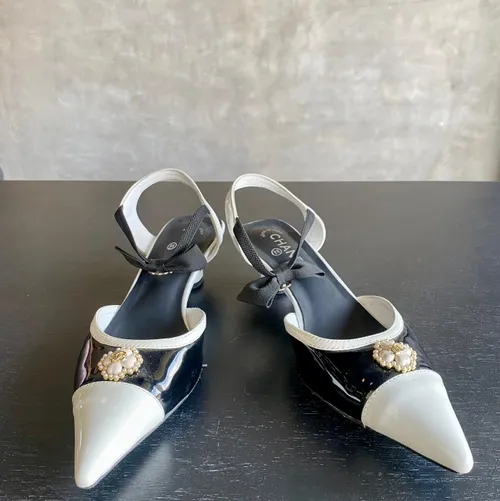 Chanel Black and White Mules with Bow