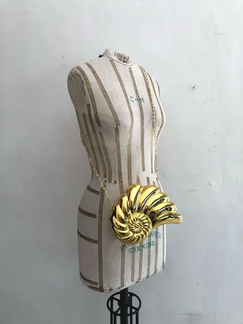 Conch Gold Clutch Bag
