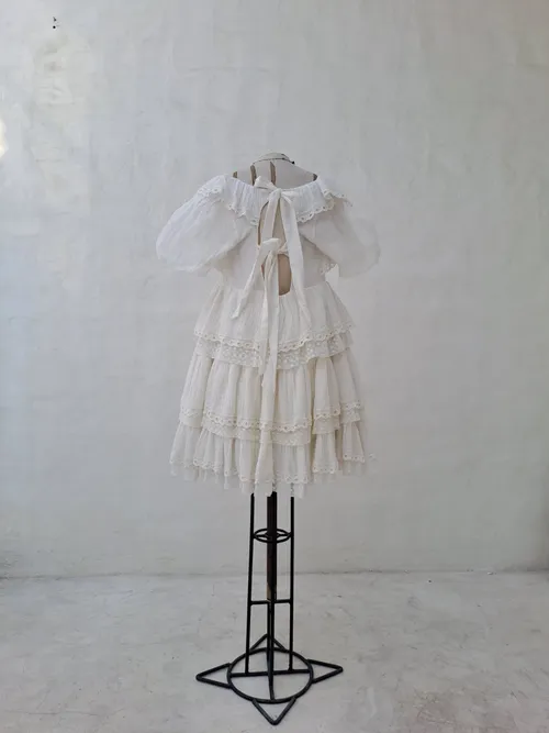 Innika Choo Ivory Short Dress with Ruffles and Bow Back