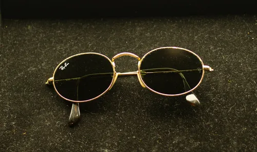 Gold Sunglasses with Oval Lens Frames