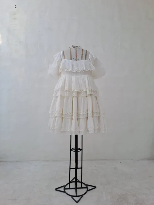 Innika Choo Ivory Short Dress with Ruffles and Bow Back