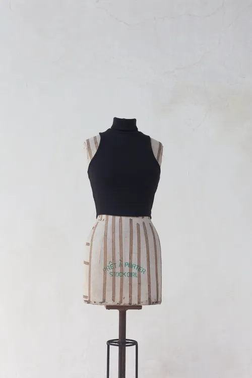 Black Sleeveless Turtle Neck