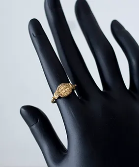 Gold Ring with Engraved Sun Face