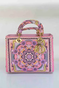 Pink Dior Handbag with Pattern and Gold Charms