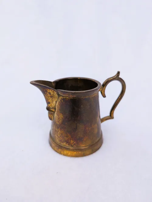 BC6 brass pitcher