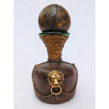 BC12 brass & leather lion bottle