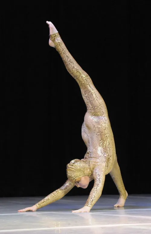 Snake hooded catsuit with gold sequins and zip back