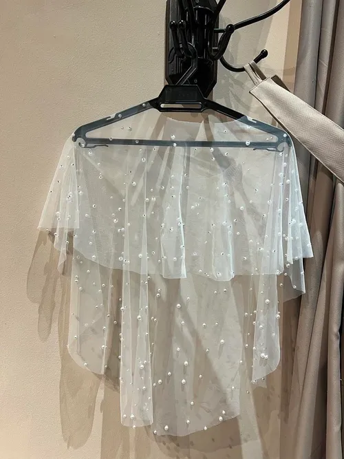 S05AAT 1260 Short long pearl bolero