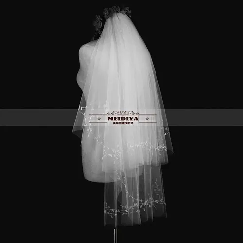 S05AAT 0759 - Pretty beaded flower short veil with comb