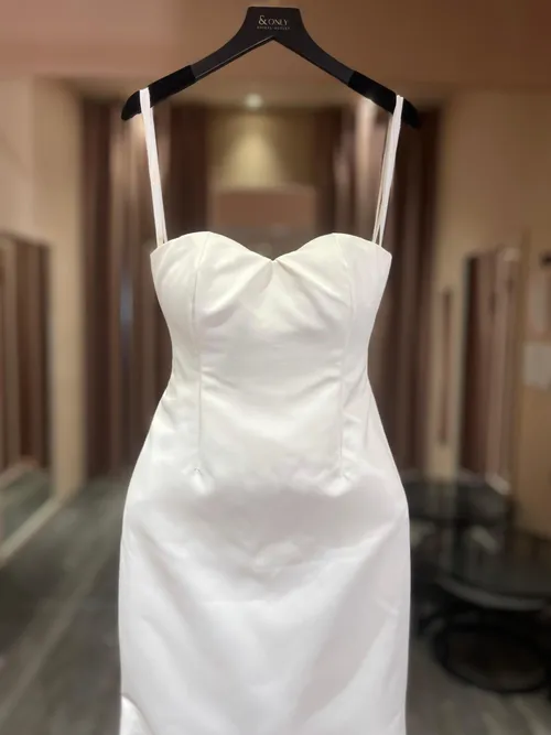 1764 - A sleek, minimalist white dress