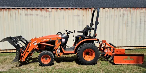 Kubota B2601 Tractor With Grapple and Grading Scraper