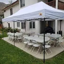 10 x 20 Popup Tent with No Walls 4 8 ft Tables and 36 Chairs 