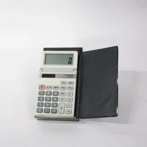 Vintage Canon Calculator Booklet - OFA571