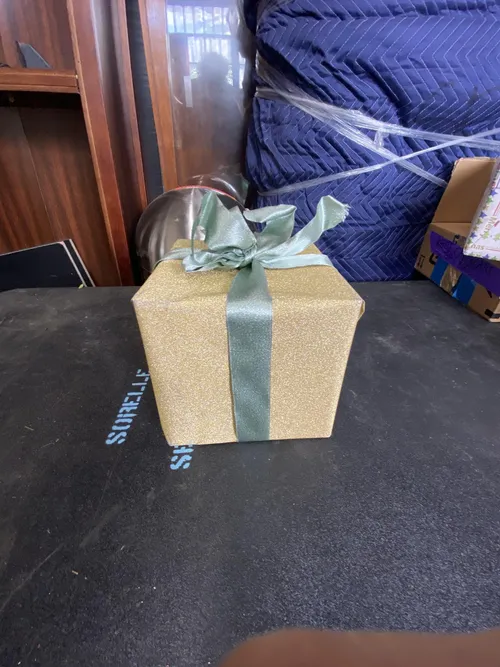 Gold Glitter Wrapped Present