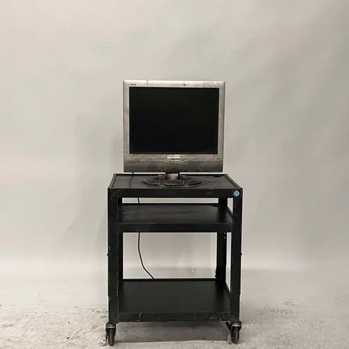 Rusted Silver Television On Black Cart - MO3532