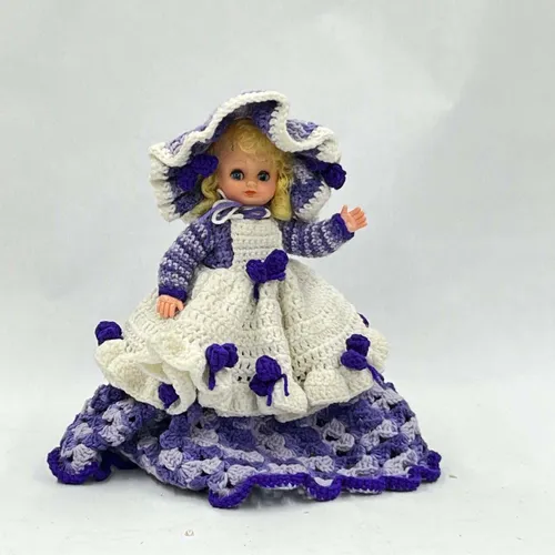 Plastic Doll With Yellow Hair & Purple Yarn Dress - MOB282