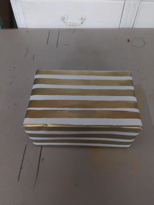 Gold Stripe Wrapped Present