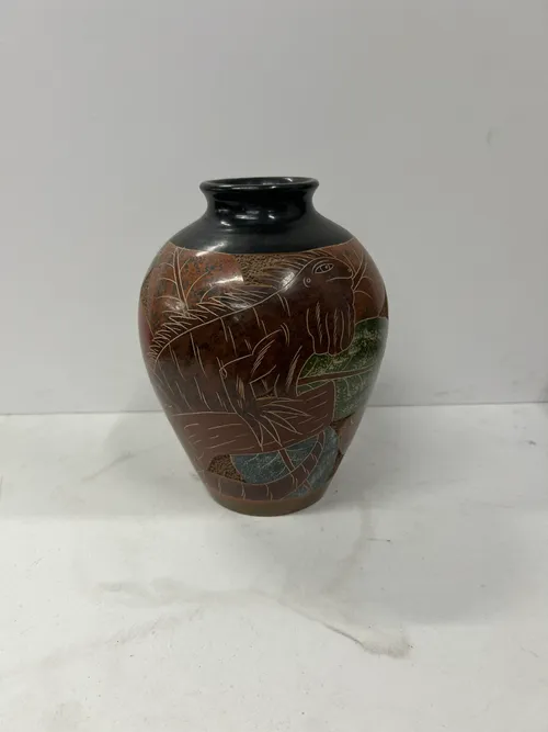 Vase with Jungle Carvings
