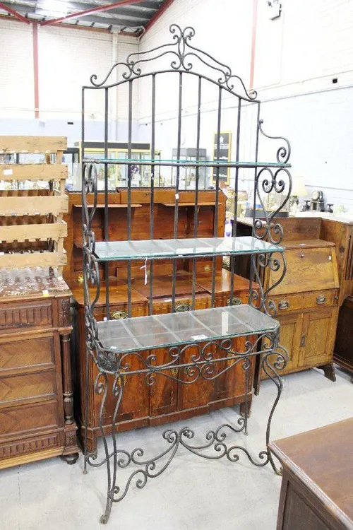 Ornate garden metal display with glass shelves