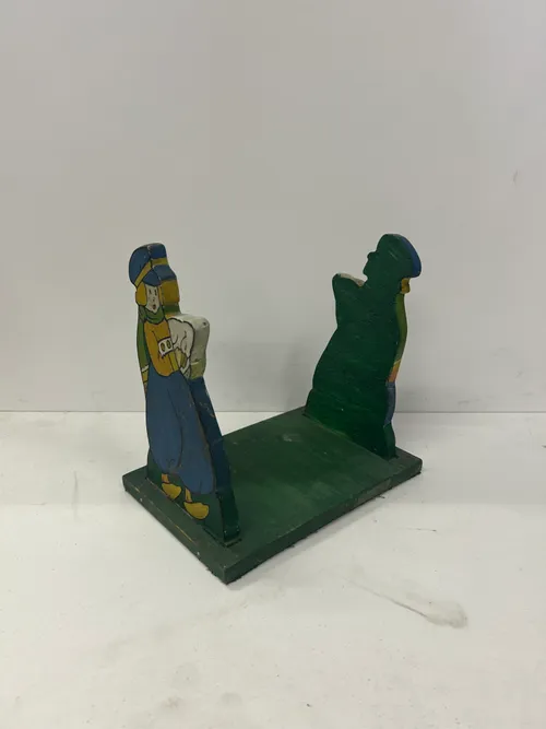 Little Girl with Goose Bookends