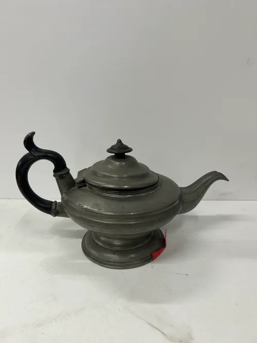 Antique Silver Teapot with Black Handle