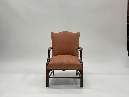 Coral Upholstered Armchair with Dark Wood Frame