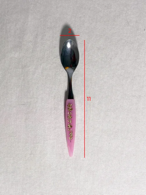 Cucchiaino manico rosa in plastica