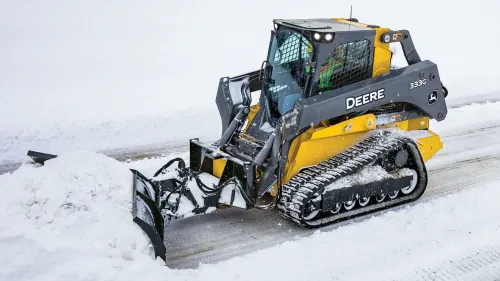 Skid Steer with Snow Blade