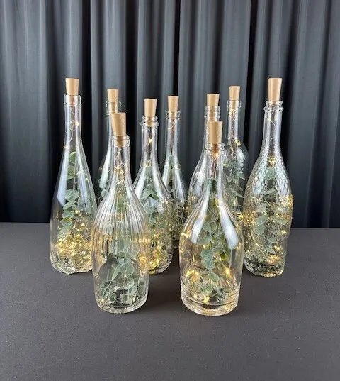 Vintage Decorative Wine Bottles w/ Eucalyptus & Fairy Lights