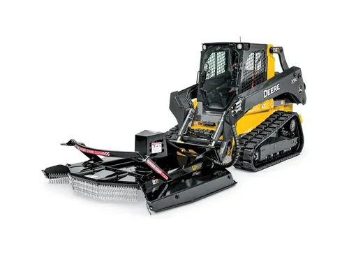 Skid steer with highbrush cutter/mulcher